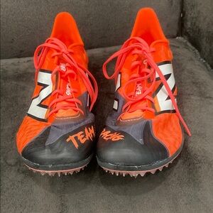 New Balance Orange and Black Athletic Shoes for Track